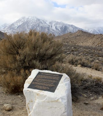 White historical marker for Buttermilk Road In Bishop, CA