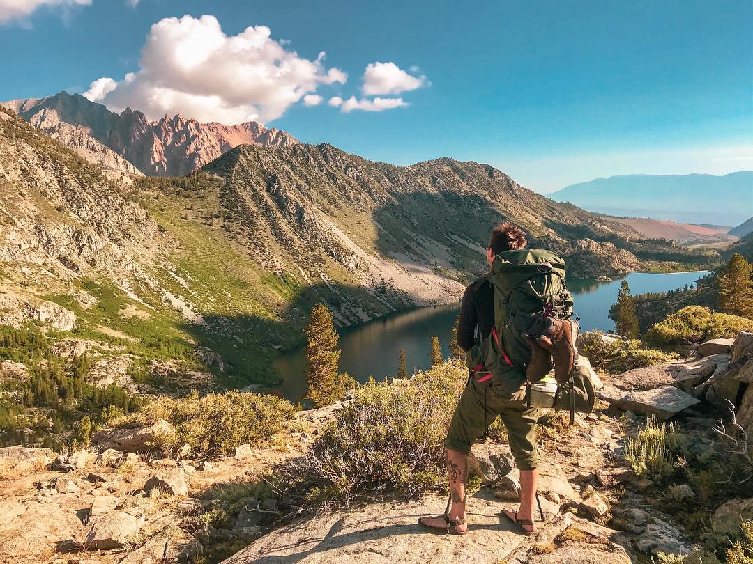 Hiker enjoying views of Lake Sabrina
