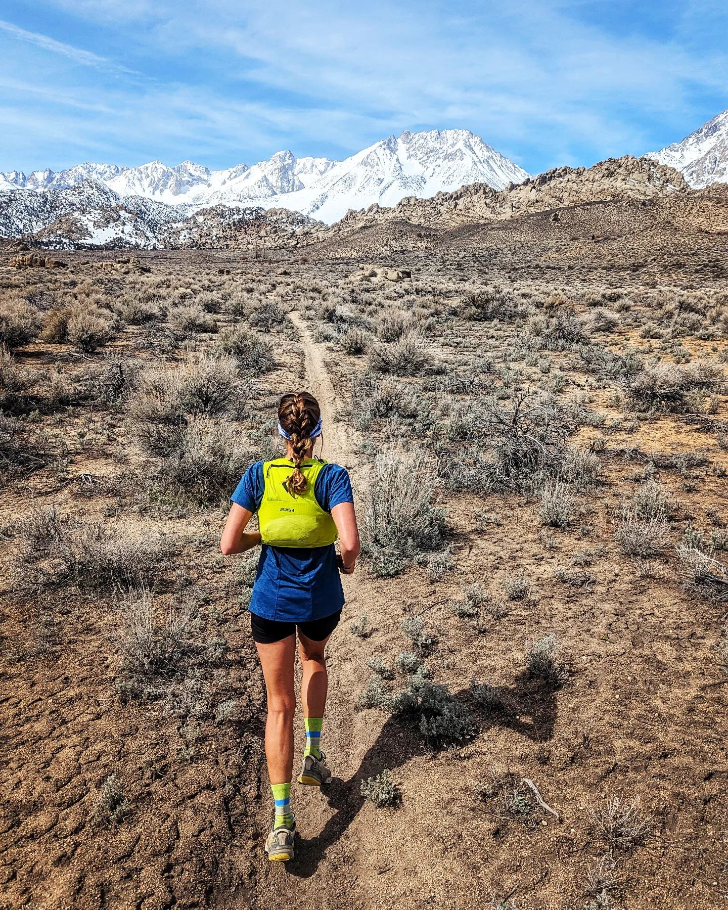 trail runner exploring one of the best trail runs in the Eastern Sierra
