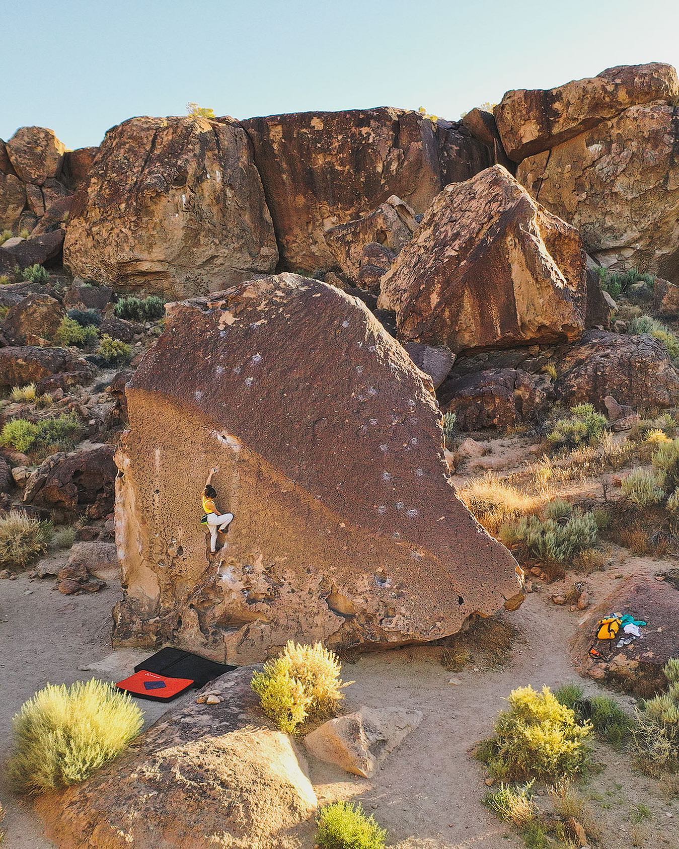 woman bouldering in Bship California in the spring