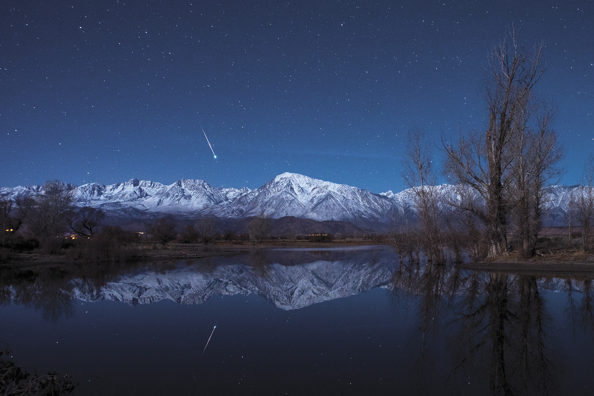 A meteor flying over the Eastern Sierra at dusk