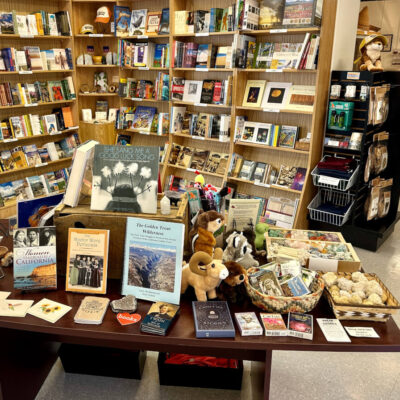 Eastern California Museum gift shop displays books, plushy toys, rocks and minerals for sale.