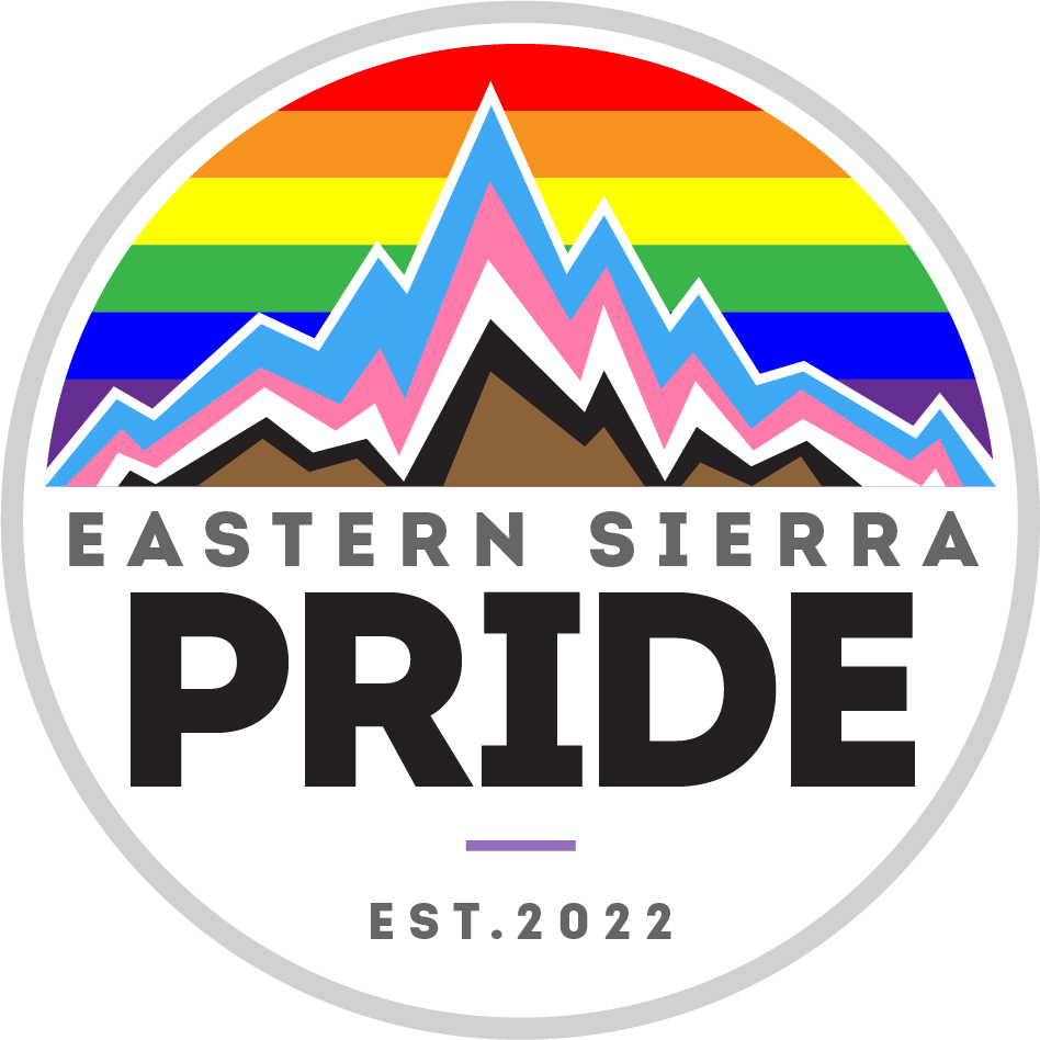 Logo for Eastern Sierra Pride featuring mountains adorned with rainbow and pride flag colors, with "EST. 2022" text below. Celebrating the vibrant diversity of Bishop, California. visit bishop