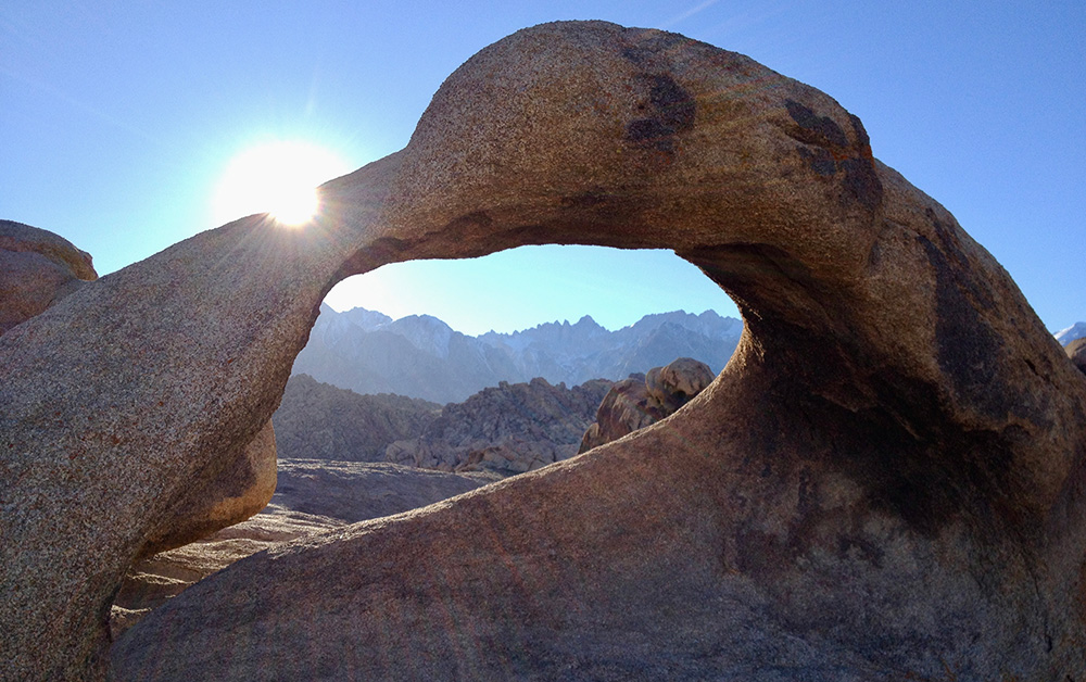 Mobius Arch frames Mt. Whitney and the Sierra Nevada skyline