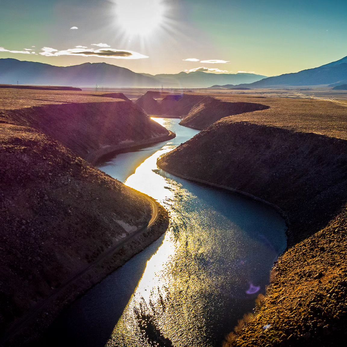 sun rising over the Pleasant Valley Reservoir