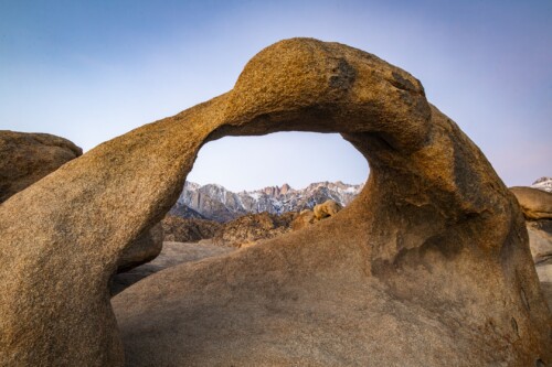 The Mobius Arch during at Alabama Hills, Lone Pine, California. Visible through the arch is Mt. Whitney, the highest point in the contiguous U.S., just couple hours away from the lowest point, Death Valley.