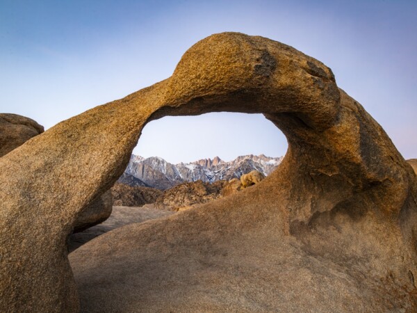 The Mobius Arch during at Alabama Hills, Lone Pine, California. Visible through the arch is Mt. Whitney, the highest point in the contiguous U.S., just couple hours away from the lowest point, Death Valley.